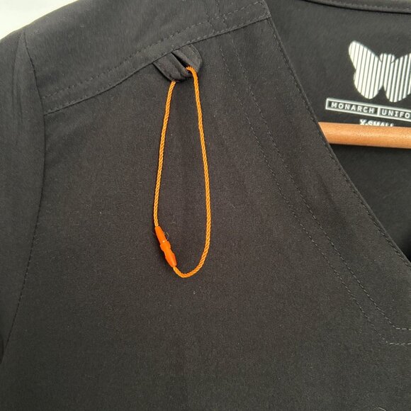 BNWOT Monarch Scrub Top in Black with Orange Detailing Size XS - Picture 2 of 10